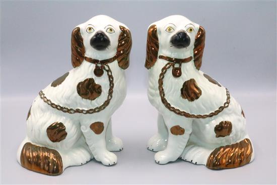 Pair Staffordshire copper lustre spaniels